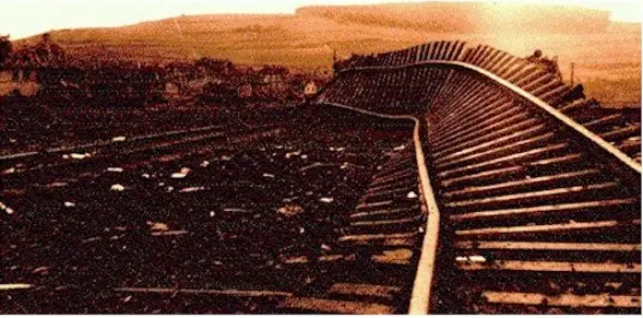 Photo shows twisted railroad tracks at Heimboldshausen, Germany following the explosion on April 3, 1945